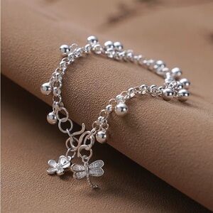 Elegant Silver Bracelet with Dragonfly and Flower Charms